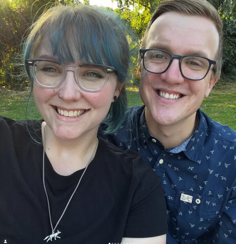 Tatiana Day and Adam smiling together in an outdoor selfie